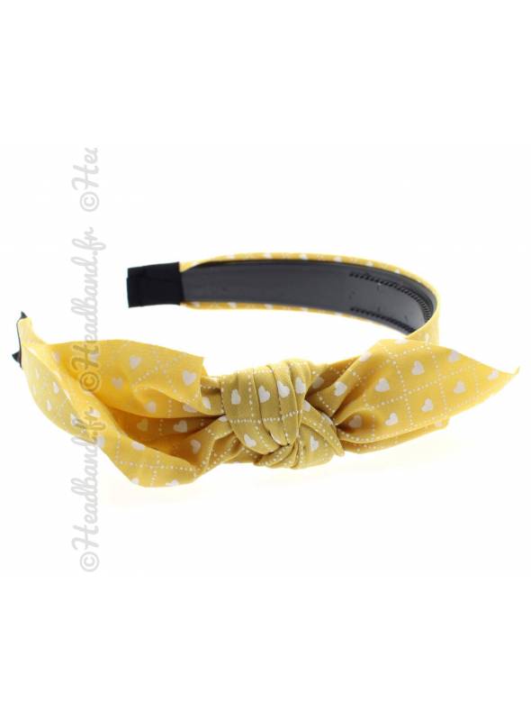 Serre-tête noeud motif coeur jaune
